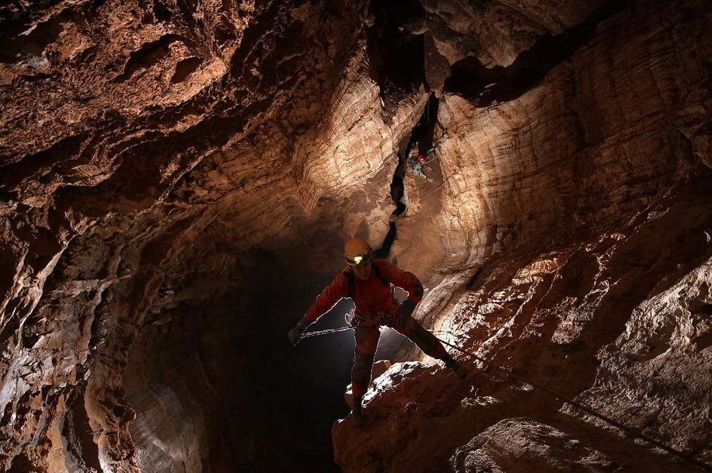 Queezer Teezer , one of the shaft teh team needs to negotiatie on the route in Vručični Snovi Cave. Montenegro, 2023. Photo: Jeff Wade.