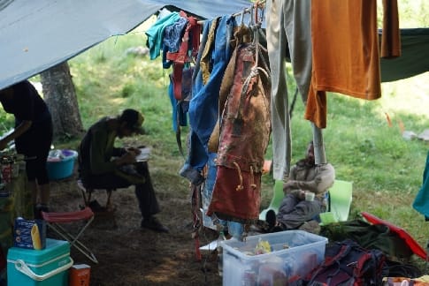 During rest days, cavers take the opportunity to dry their cave gear and improve the sketches done in the cave. Photo: Sara Fleetwood